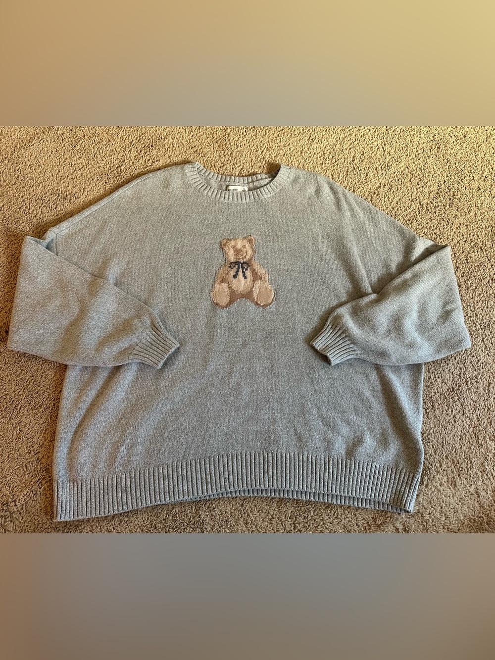 Hollister Light Gray Crewneck Sweater with Beige Teddy Bear.